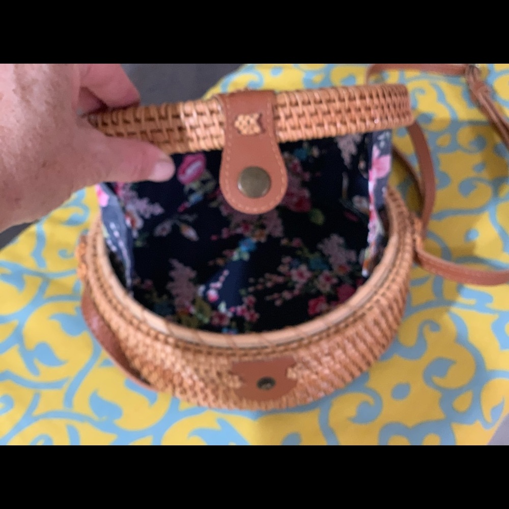 Woven Crossbody bag with leather strap.